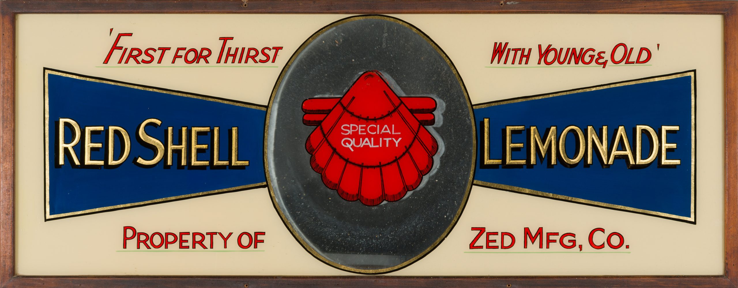 advertising mirror which has a red shell illustration at the centre, it reads 'FIRST FOR THIRST WITH YOUNG AND OLD / RED SHELL LEMONADE / PROPERTY OF ZED MFG, CO.'