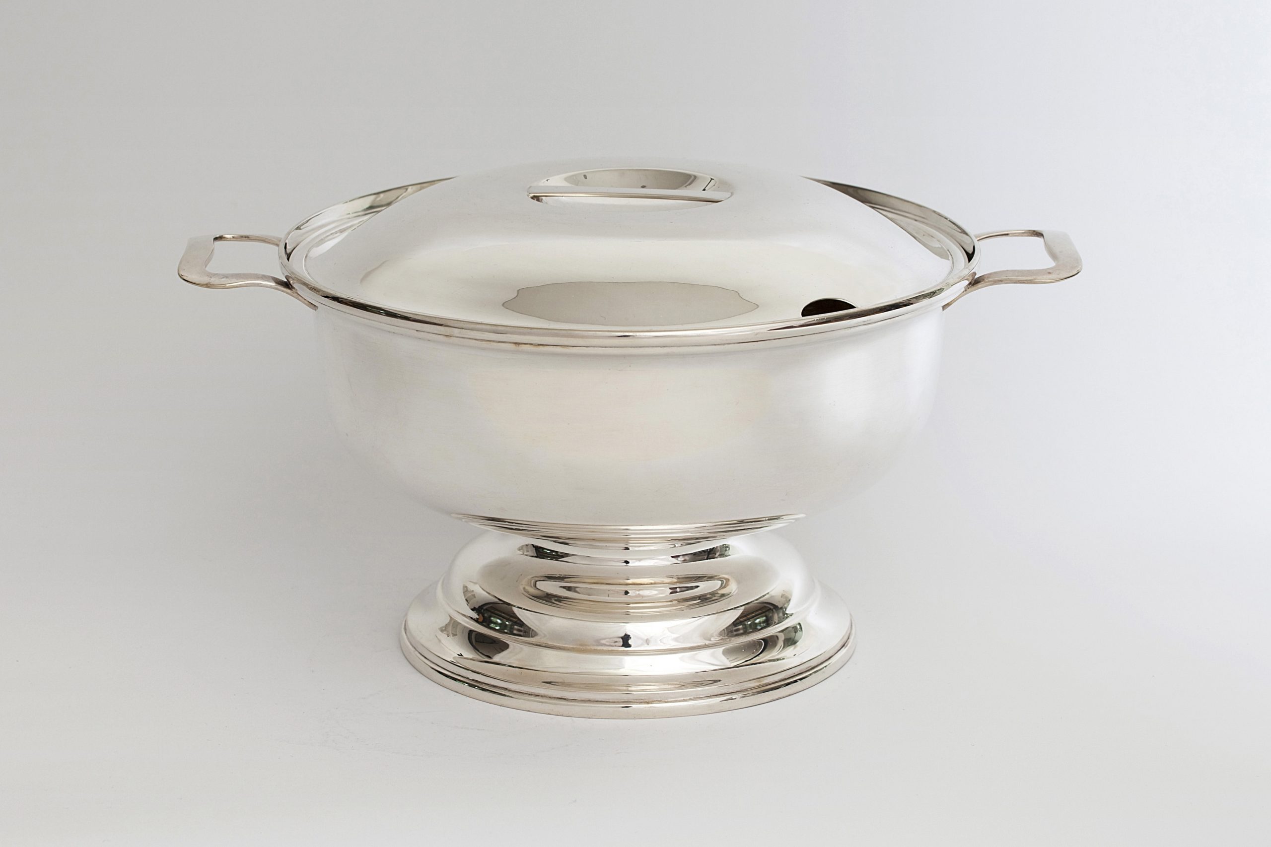 Sleek silver tureen with a cover