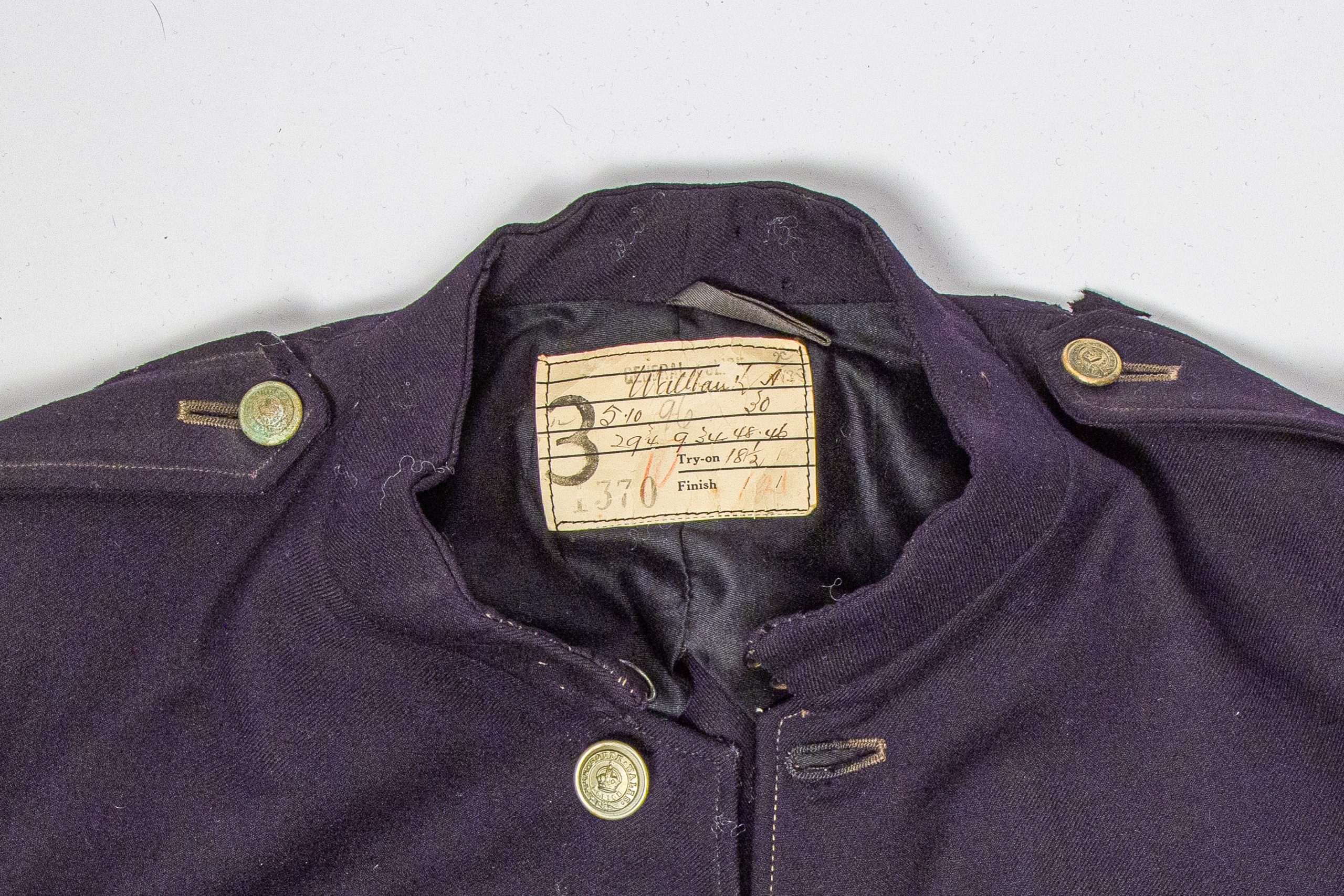 Close-up shot of the collar and tag of a police jacket
